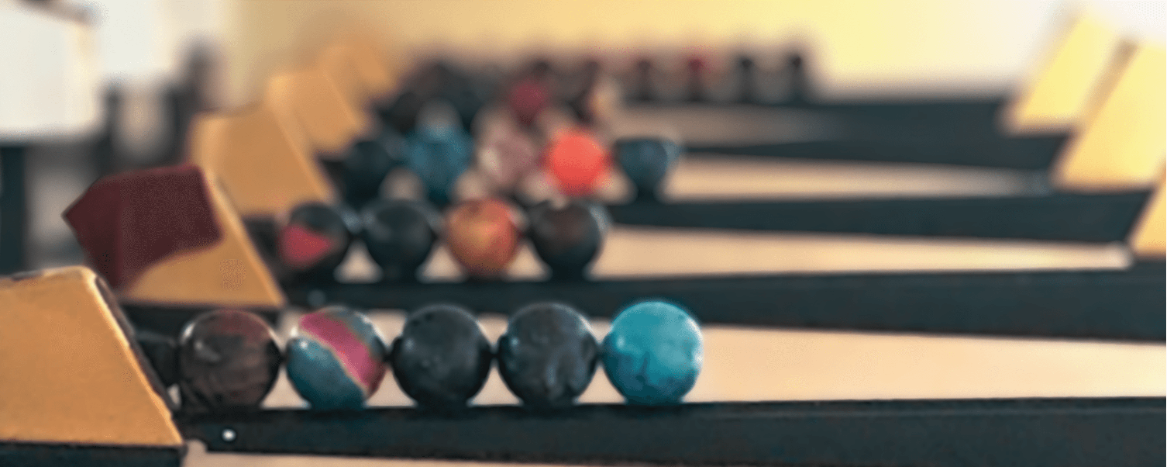 Bowling balls lined up at Tiger Bowl in Excelsior Springs MO